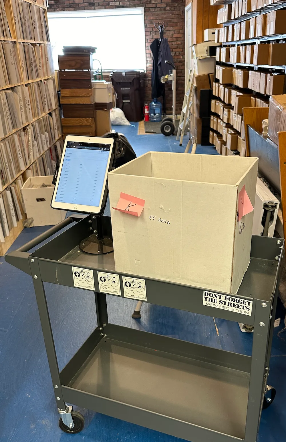 A Cratebase picking trolley in use in a record store